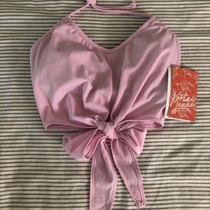 Kortni Jeane halter tie top. Light pink ribbed.